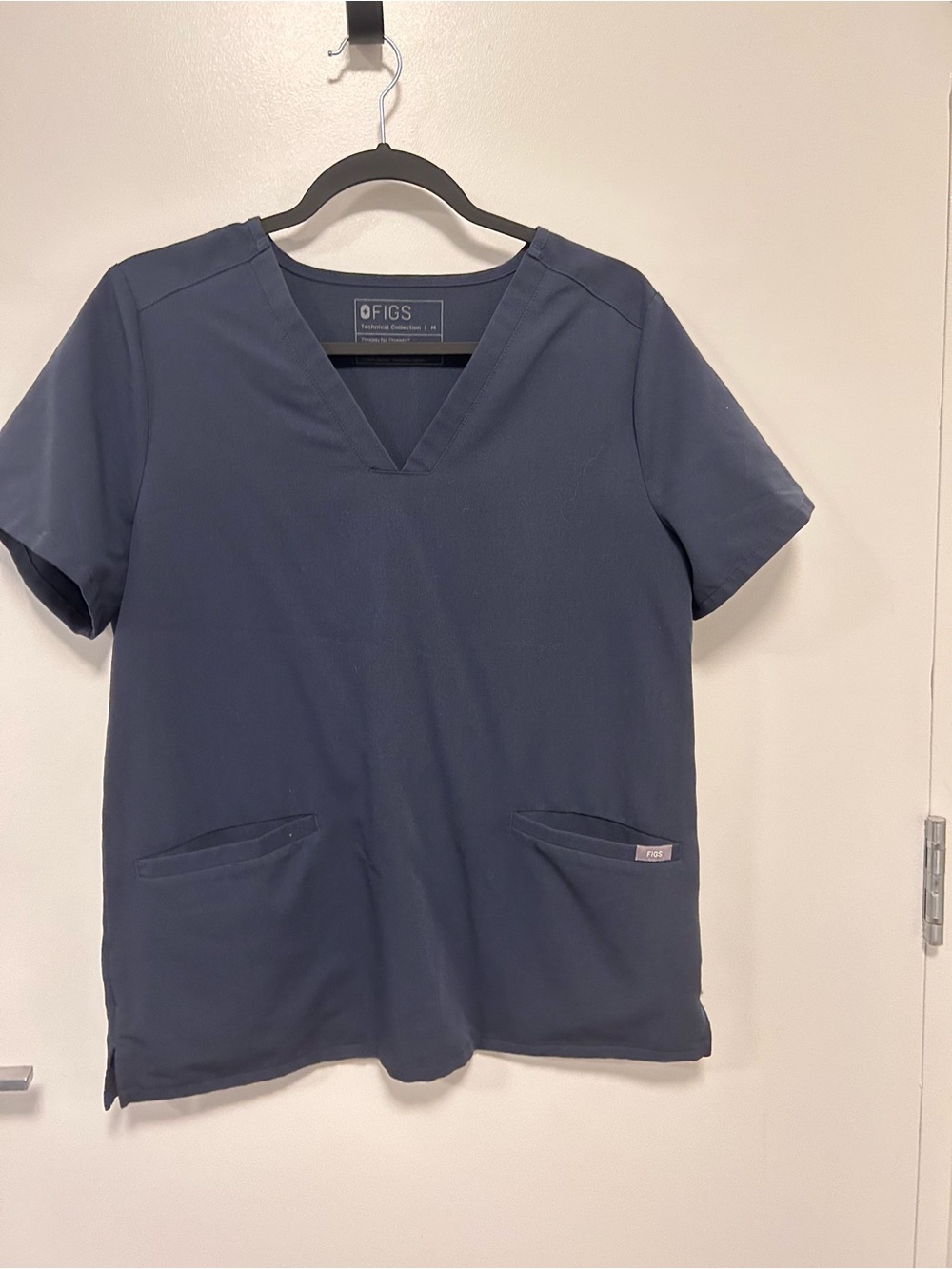 Figs jogger style scrub pants and Short Sleeve V-Neck Scrub Top in Charcoal